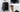 What are the benefits of using a roller case compared to a traditional backpack for camera gear?